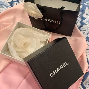 VINTAGE Chanel NWB camellia brooch. Never worn; still in original packaging.
